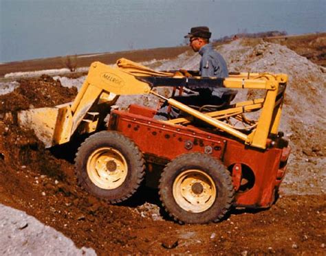 who invented the first skid steer|history of skid steer loaders.